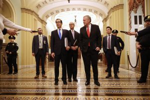 Markets rally on Fed’s QE, eyes on senate