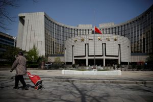 China central bank says to cap property loans by banks