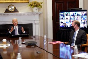 Biden vows action on semiconductor shortage, citing China threat