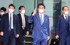Investors mildly positive, BoJ steps up bond buying