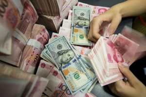 Yuan caught in global stock markets downdraft