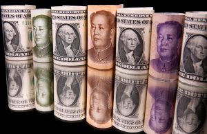 Yuan firm after a soft start, swinging higher on dollar selling