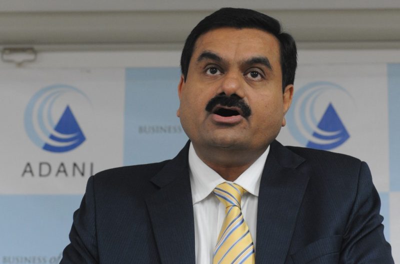 Shares of companies run by Gautam Adani fell on Tuesday after a report by a unit of Fitch saying the group was 'deeply over-leveraged'.