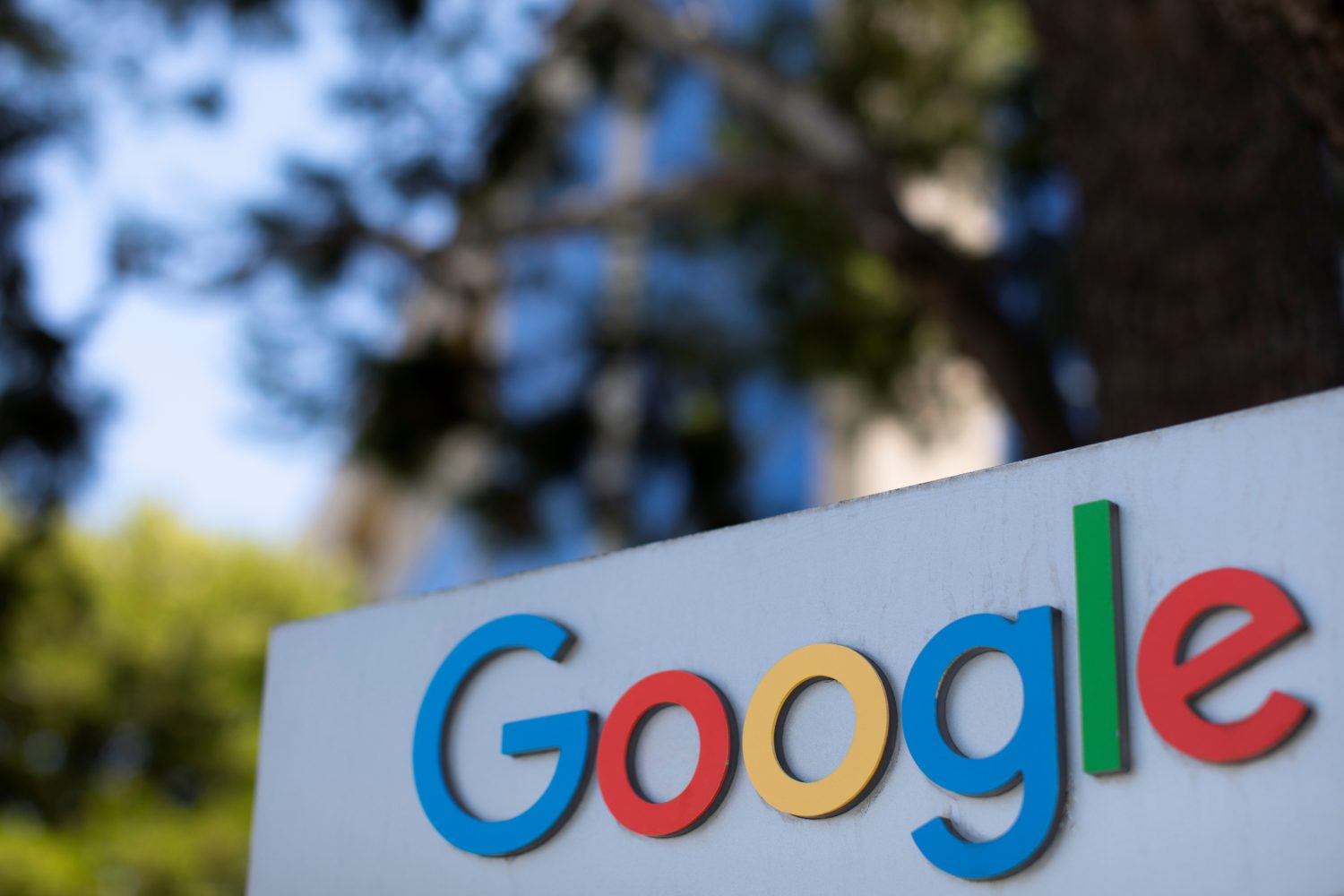 A Google sign is seen at its office in California