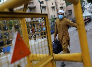 Indian state makes returning migrants pay for quarantine