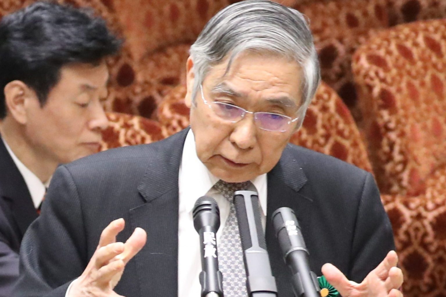 Japan's central bank chief has apologised for saying households were becoming more accepting of rising prices after a backlash.