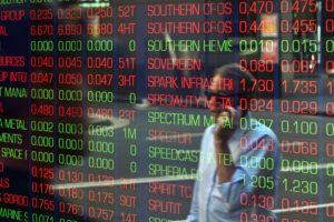 Turmoil in Asian Markets as Shares Sink and Oil Soars