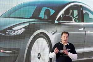 Tesla’s Elon Musk promises big cuts in electric car costs
