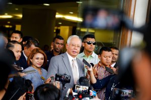 Najib gets 12 years jail for corruption in first 1MDB trial