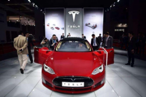 Tesla becomes richest auto group as Detroit giants see sales drop