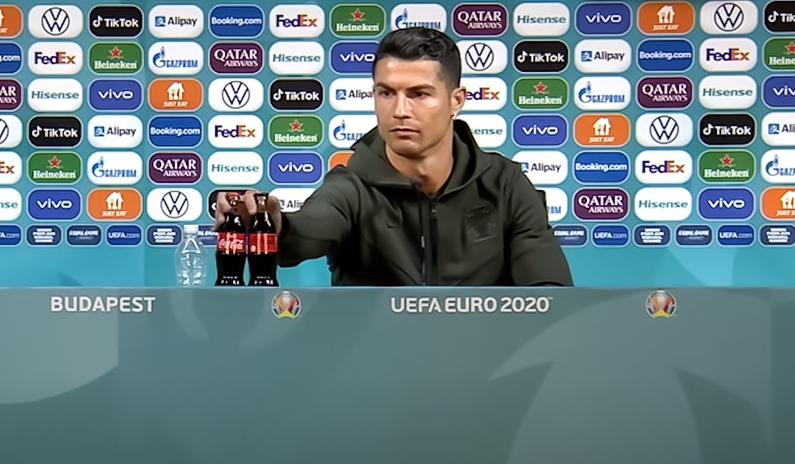 Cristiano Ronaldo removes bottles of Coca Cola