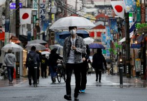 Japan’s Growth Forecast Cut With Pandemic Curbs Set to Take a Toll