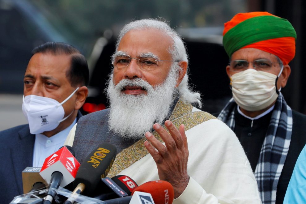 India's Prime Minister Narendra Modi arrives at the parliament house to attend the first day of the budget session, in New Delhi