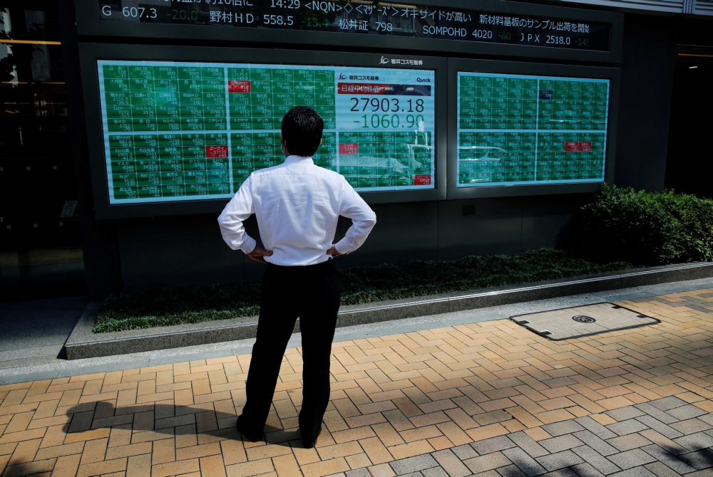 Asian Shares Drop on Risk of More US, EU Rate Hikes