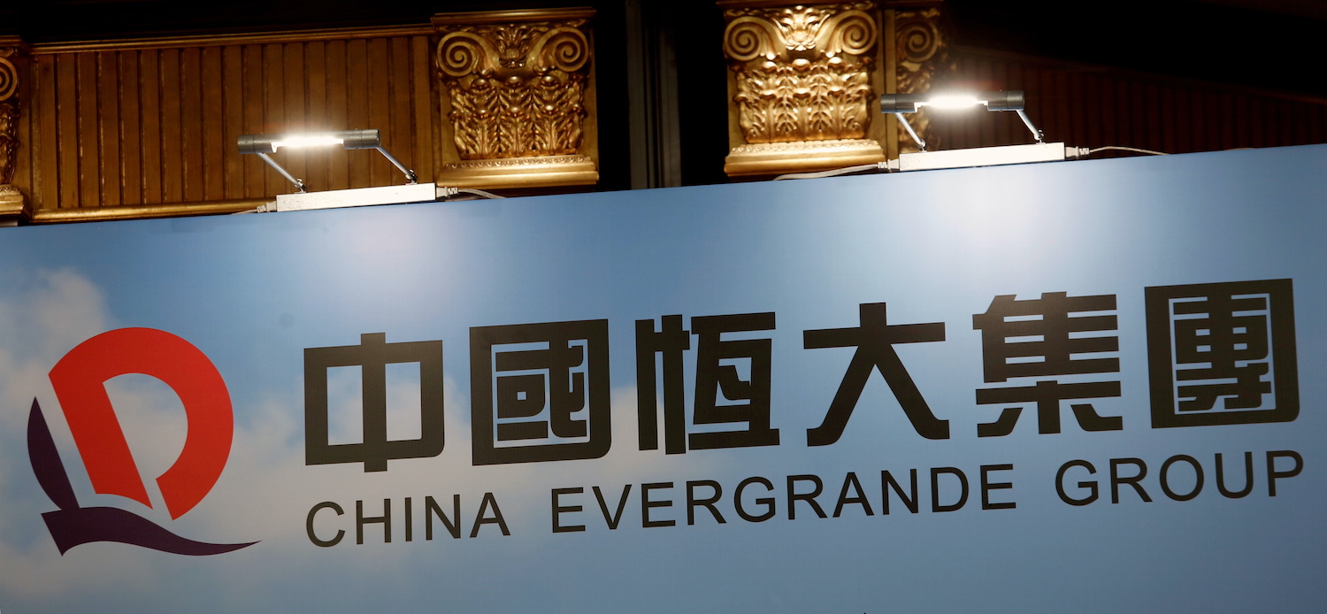 China Evergrande Onshore Bond Trading Suspended After Downgrade