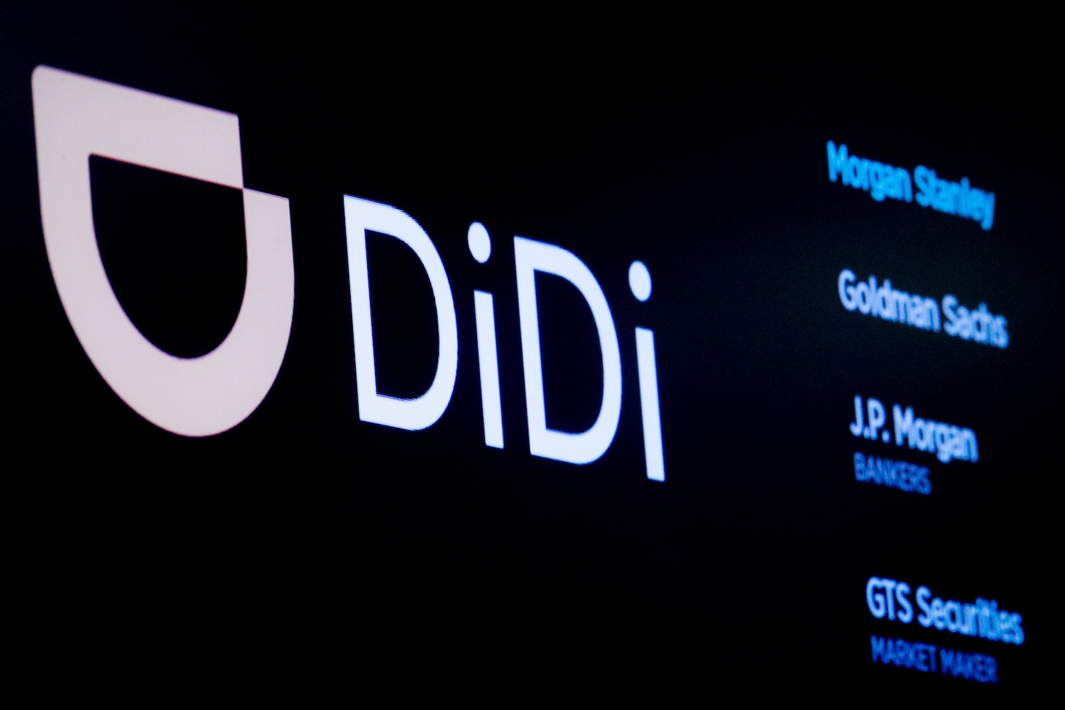 The logo for Chinese ride-hailing company Didi Global is seen during the IPO on the New York Stock Exchange