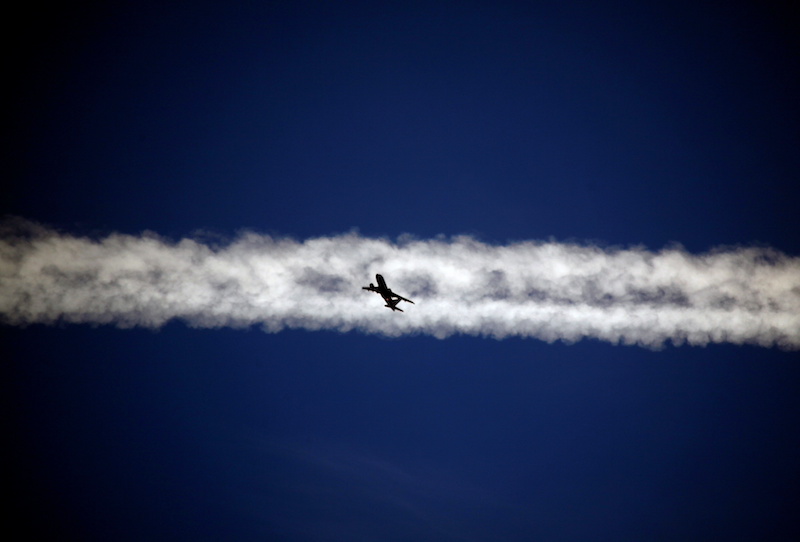 Plane flying above Padova