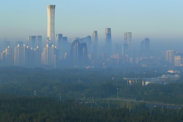 Pollution is seen on the skyline of Beijing. Photo: Reuters
