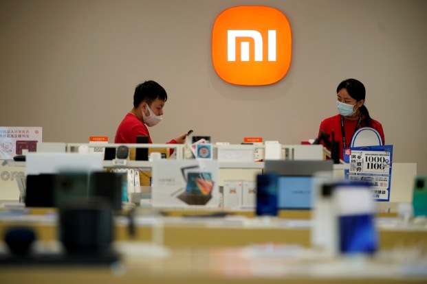 Xiaomi Switches China Strategy With Eye On EV Showrooms