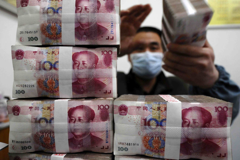 Man counts Chinese yuan