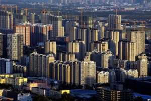 China Property Investments Fall 4% Ahead of Bond Maturities