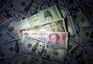 Asia Central Banks’ $30bn Forex Fight to Fend Off Dollar