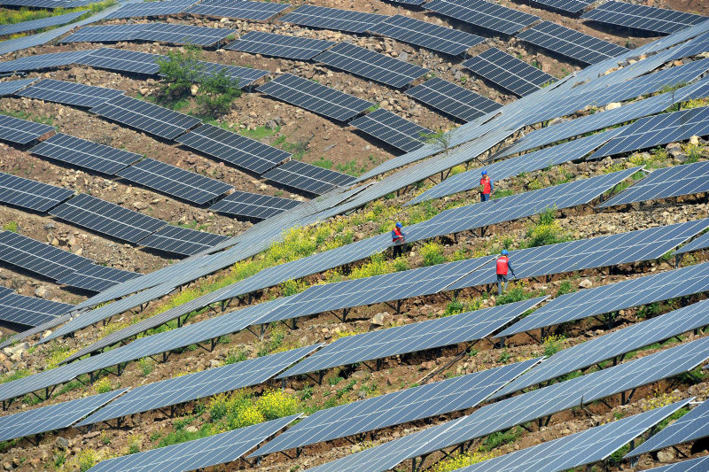 China has seen a 'jaw-dropping surge' in solar and wind power capacity, but its outdated power grid needs improvements, experts say.