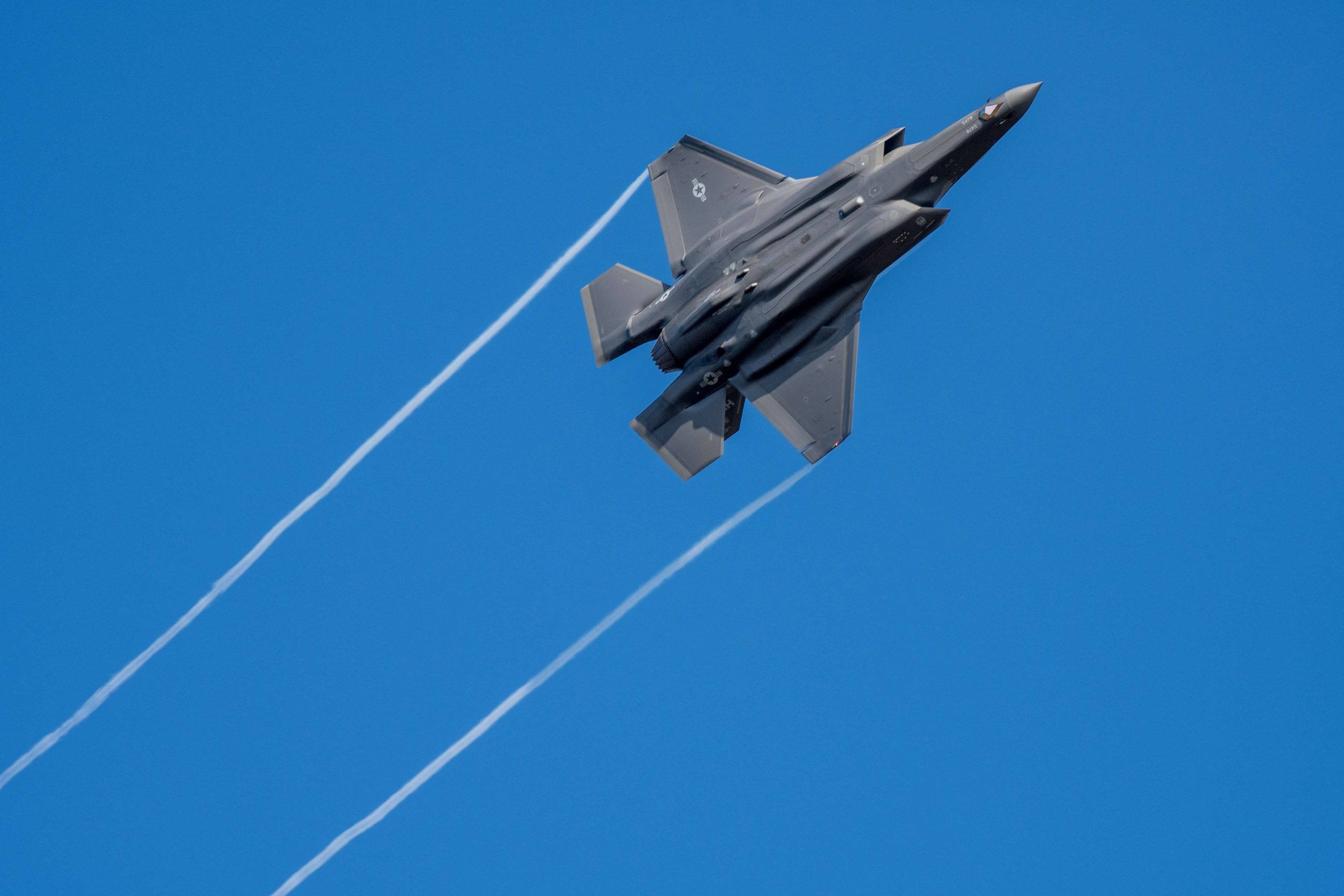 A US F-35 fighter jet flies over the Eifel Mountains near Spangdahlem