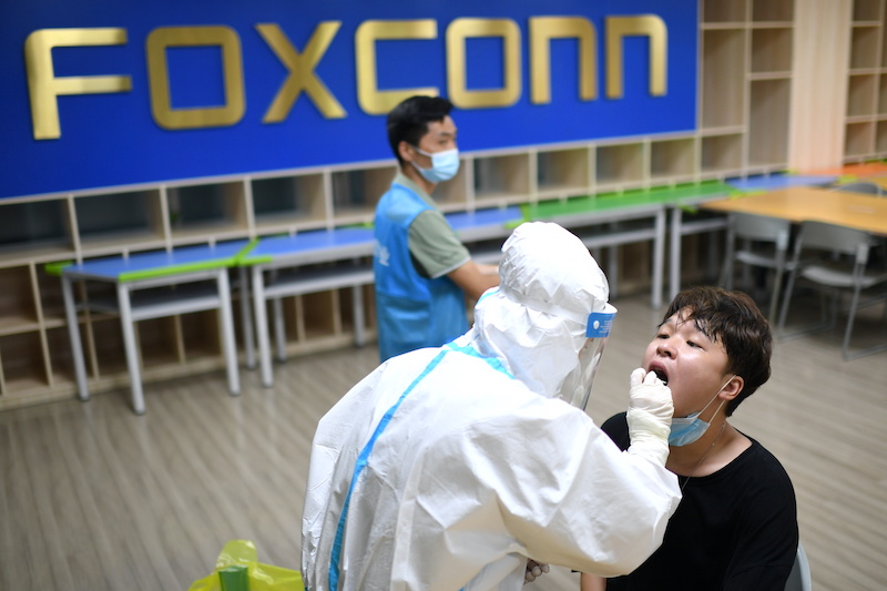 Foxconn said on Wednesday it will continue Apple with its 'closed loop' work set-up to avoid Covid infections.