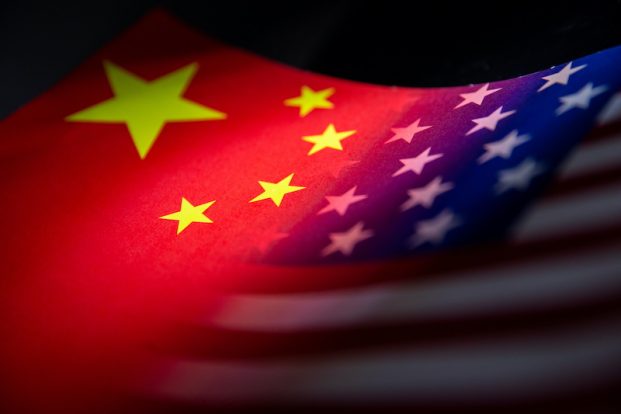 US officials are concerned about possible espionage after 100 Chinese nationals were found near military bases or sensitive sites in recent years, a report said on Sunday.