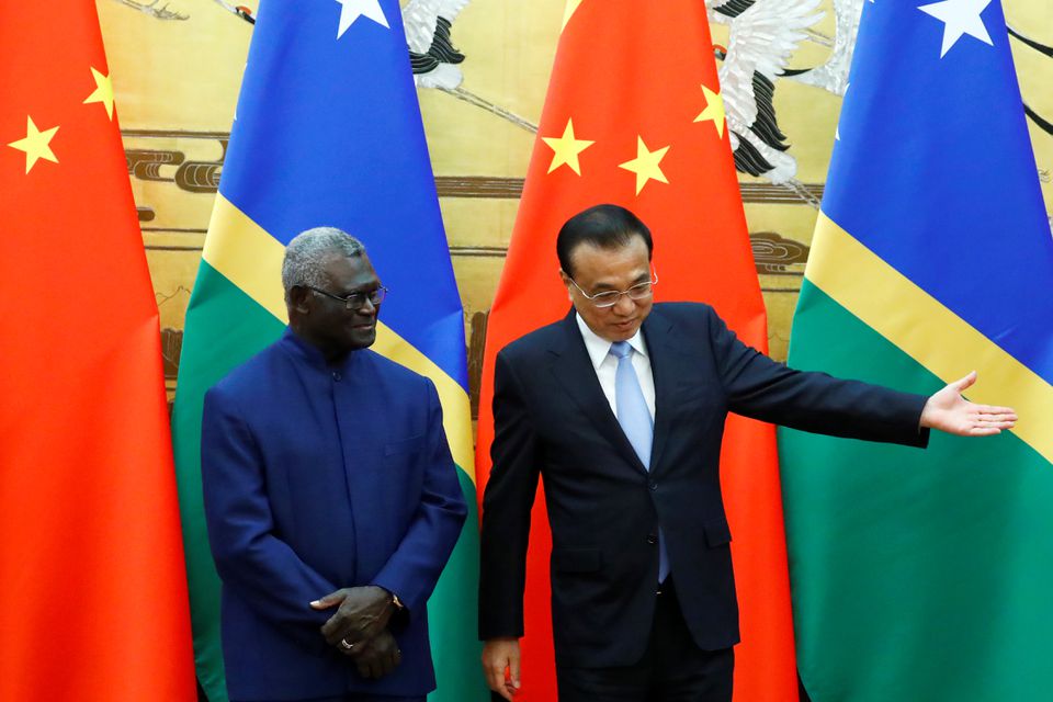 Solomons PM Manasseh Sogavare and China's Li Keqiang in Beijing