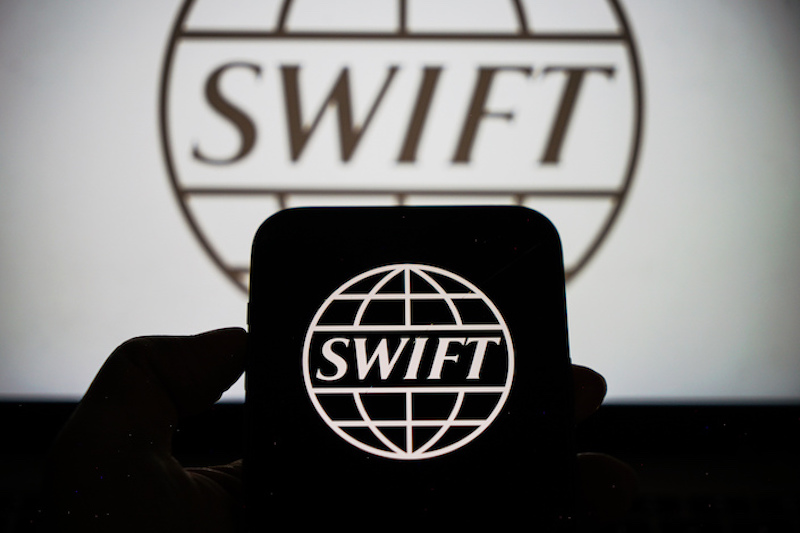 An illustration showing SWIFT logo