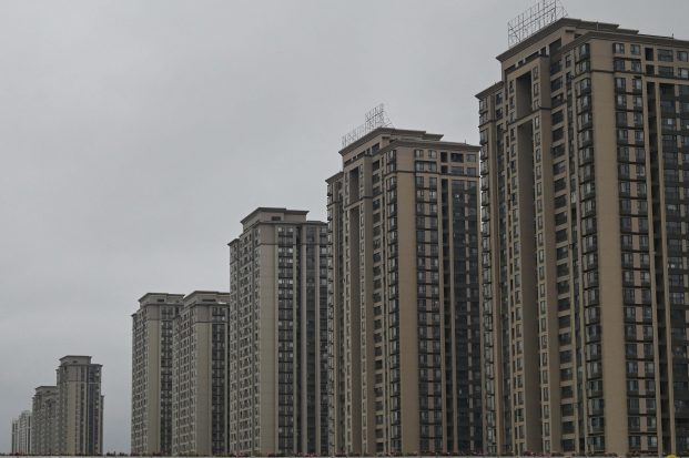 A research group apologized on Thursday for a property report that said China had a high rate of vacancies.
