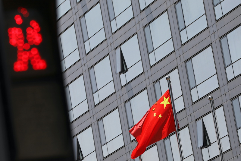 Law firms in China have heeded a request to tone down the language used to describe 'China risks' in IPO application documents, but some say the move could provoke queries from the US regulator.