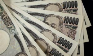 Bank of Japan Minutes Show Board Split On Plunging Yen