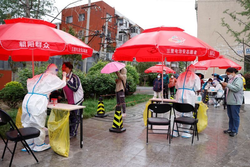 Medical workers in protective suits