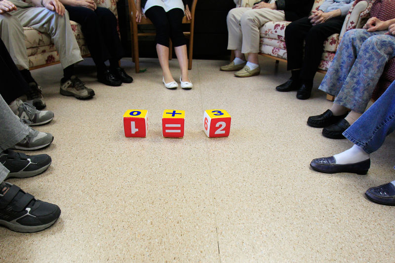 Asia health: People with dementia attend memory training at a community ambulatory care facility in Hong Kong.