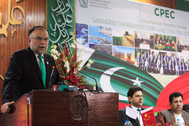 Chinese power companies concerned over unpaid debts in Pakistan met with Pakistan's minister of planning and development Ahsan Iqbal, seen here.