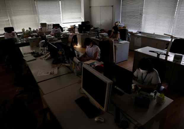 METI building is dimly lit to save electricity