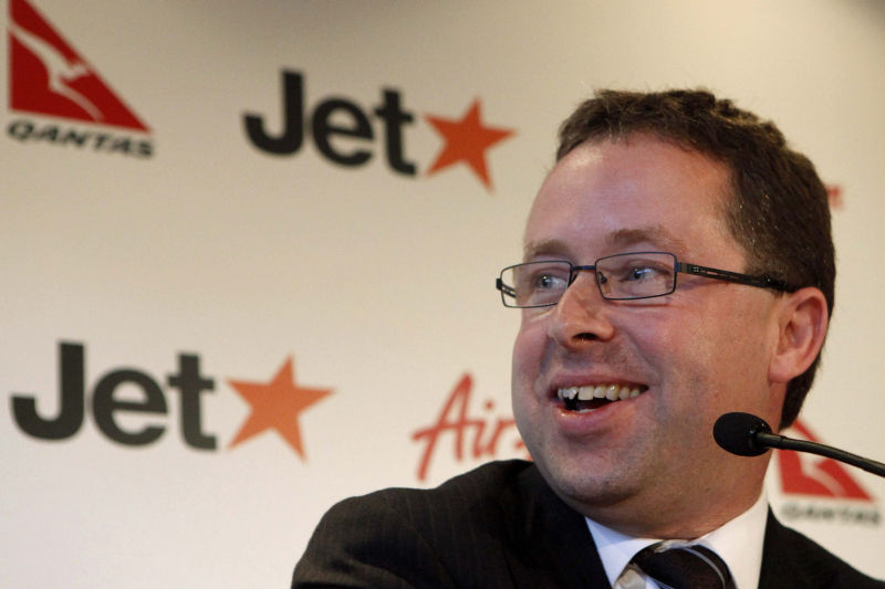 Qantas Airways said on Friday it expects to return to a profit next year as another potential successor to CEO Alan Joyce resigned.