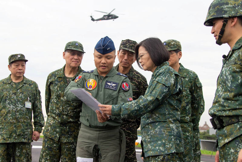 Taiwan President Tsai Ing-wen talks to an air force pilot during the Han Kuang military exercise simulating China's People's Liberation Army (PLA) invasion of the island, in Changhua