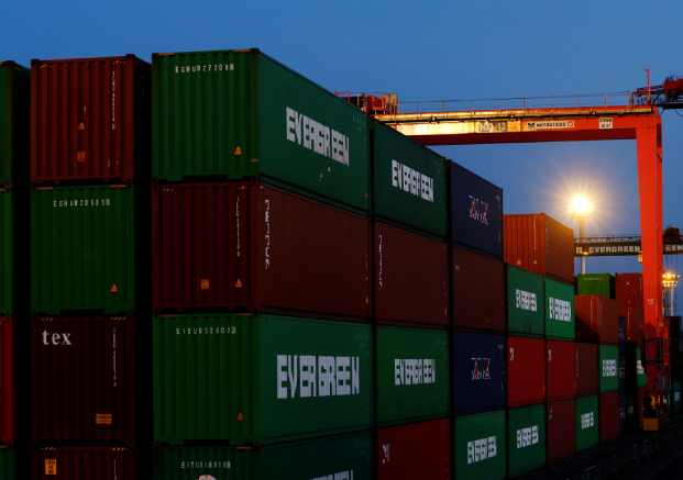 Stacked containers are seen at an industrial port in Tokyo, Japan