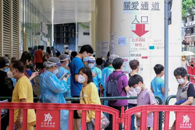 Residents line up to get tested for Covid-19 in Macau.