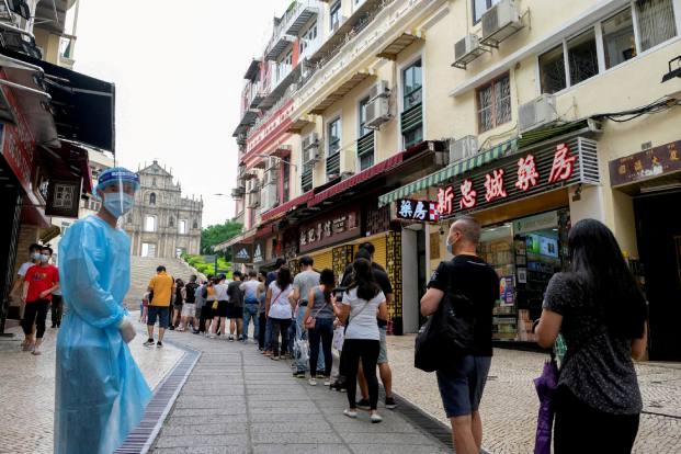People queue for Covid-19 testing in Macau