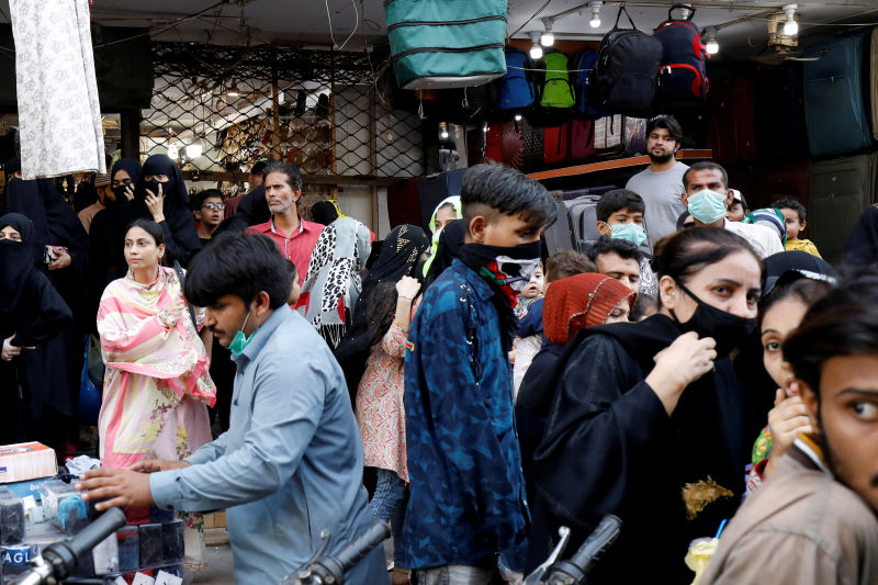 Struggling Pakistan has bowed to pressure from trading partners and domestic retailers by lifting a two-month ban on non-essential imports.