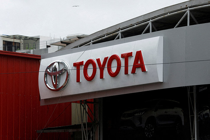 Toyota's logo is seen at a Toyota Society Motors showroom in Karachi, Pakistan, July 27, 2022. REUTERS/Akhtar Soomro/File Photo