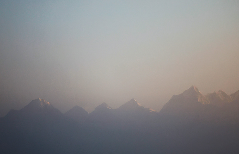 Mount Everest, the world highest peak, and other peaks of the Himalayan range are seen during the sunrise from Ratnange hill in Solukhumbu, Nepal on March 27, 2022. REUTERS/Navesh Chitrakar