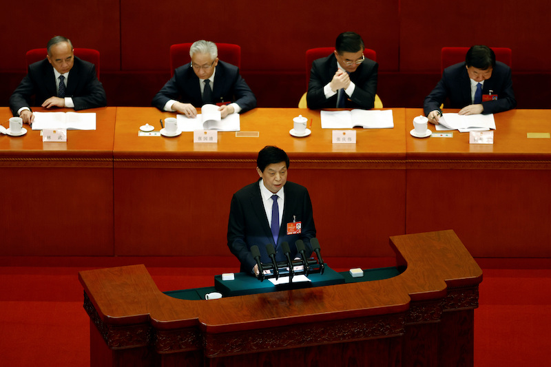 National People's Congress (NPC) Standing Committee Chairman Li Zhanshu speaks at the second plenary session of the NPC at the Great Hall of the People in Beijing, China March 8, 2022. REUTERS/Carlos Garcia Rawlins