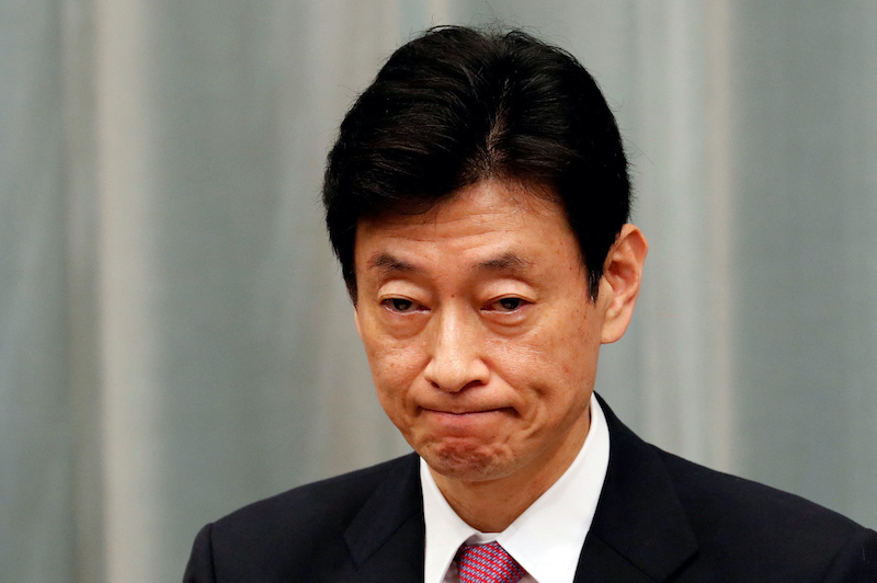 Japan's Minister in charge of economic revitalisation and measures for the novel coronavirus pandemic Yasutoshi Nishimura attends a news conference in Tokyo, Japan, September 16, 2020. REUTERS/Kim Kyung-Hoon