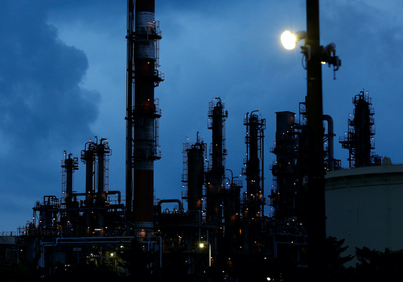 Factory chimneys are seen at Keihin industrial zone in Kawasaki, south of Tokyo, Japan, August 18, 2016. REUTERS/Kim Kyung-Hoon